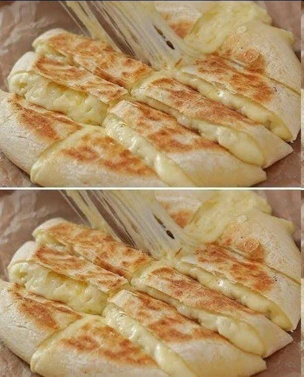 Pane all’aglio con formaggio friabile: una delizia irresistibile da condividere